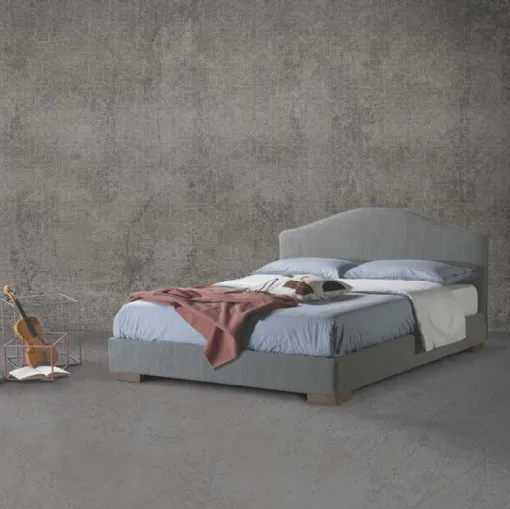 Letto in tessuto con testiera sagomata Cassiopea di Lettissimi